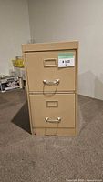 Front view showing two drawers, handles, Cole badge, and overall color