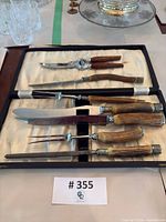 Entire set in open case showing knife, fork, steel, shears and case