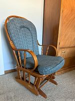 Full view of Dutailier wooden glider rocking chair