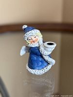 front view of blue Goebel angel figurine candleholder