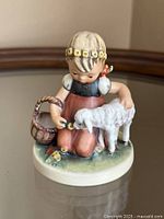 Front view of Goebel Hummel "Favorite Pet" figurine