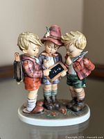 Front view of Goebel Hummel School Boys figurine