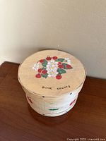 Top view showing hand painted cherry motif and "Door County" script