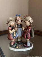 Front view of M.I. Hummel Schoolgirls figurine