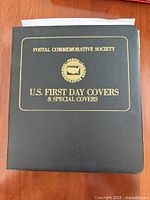 Front of black binder showing title