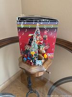 Full view of Schmid wooden Toyland Christmas music box and original packaging