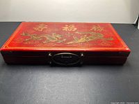 closed red dragon case front view