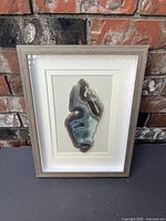 Front view of framed agate slice