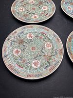 Two plates showing full pattern, colour and border detail