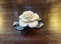 Front view of porcelain rose showing overall form and coloration