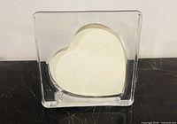 Front view of clear square crystal frame with heart opening