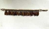 Anklet fully extended showing chain and wooden bead dangles