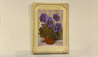 Full view of framed Florentine artwork hung on wall