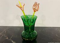 green Murano vase with two glass flowers front view