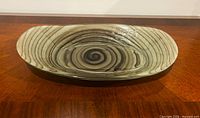 Top view of oval glass bowl showing spiral design