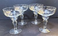 Four margarita glasses front view