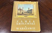 Front cover with dust jacket showing title, authors, color illustration