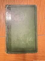Front cover of green cloth hardcover book