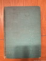 Front cover of green cloth hardcover book