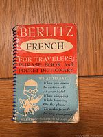 Front cover showing title, wear on edges