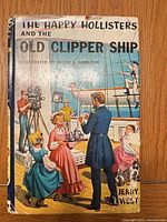 Front cover with illustrated dust jacket showing title and author