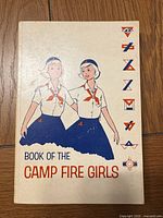 Front cover showing title, illustration, and symbols