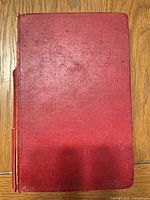 Front cover of red cloth hardcover