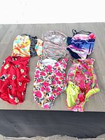 All six bathing suits laid out for overview