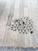 Group view of entire lot: two wrenches and assortment of sockets