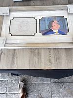 Full framed cel and sketch wrapped in protective film