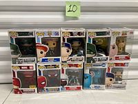 Front view of all ten boxed figures