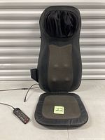 Front view of Dr. Ho chair massager with remote handset