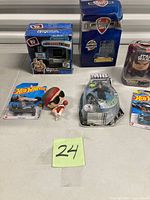 Overview of all six toy collectibles on table