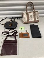 Group shot of all five items laid out on floor