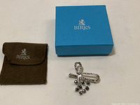 Brooch, Birks box, Birks pouch overview