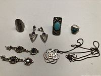 Group photo of all six jewelry pieces