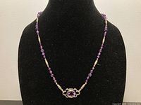 Full view of necklace on display bust