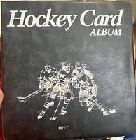 Front cover of black Hockey Card Album binder