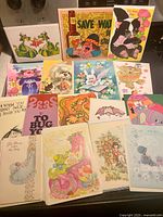 Front view of assorted vintage greeting cards laid out
