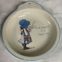 Front view showing illustration and inscription