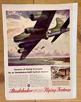 Front of advertisement showing B-17 illustration and Studebaker branding