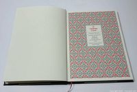 Front endpaper pattern and title page tip-in