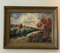 Front view of framed oil painting showing full artwork and frame