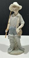 Full view of Lladro Young Fisherman figurine front
