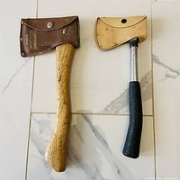 Both hatchets front view with sheaths on