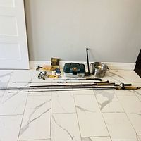 Overview of rods, tackle box, stainless pot, accessories