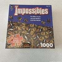 Front of sealed Impossibles 1000-piece Butterflies puzzle box