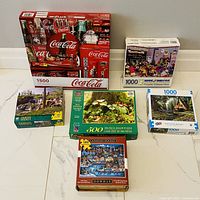 Group shot of all five puzzle boxes