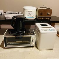 All six kitchen appliances arranged together