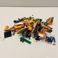 Pile of assorted Lego pieces on table